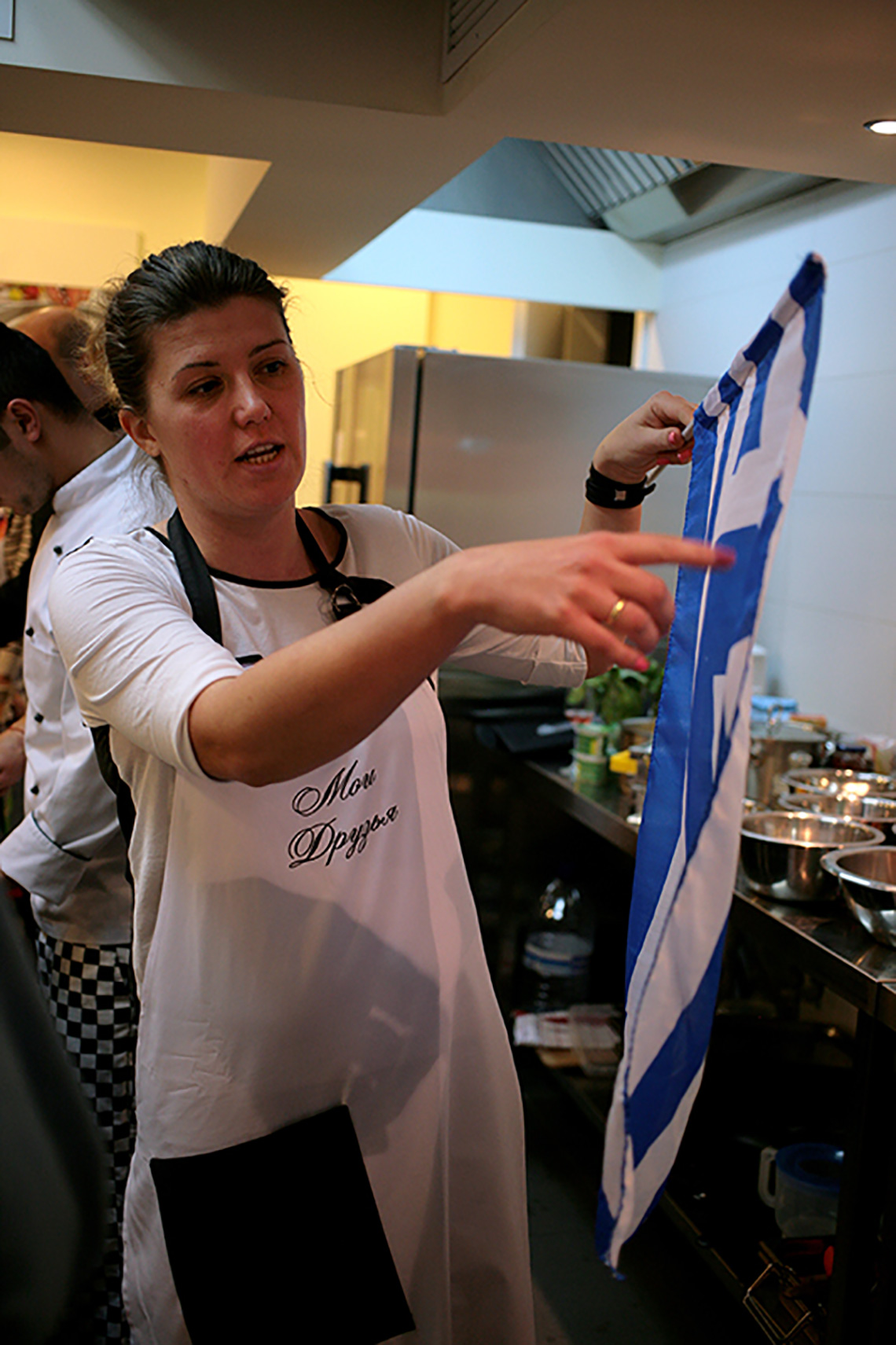 Greek flag. Greek cuisine dishes. Cooking school in Ukraine.