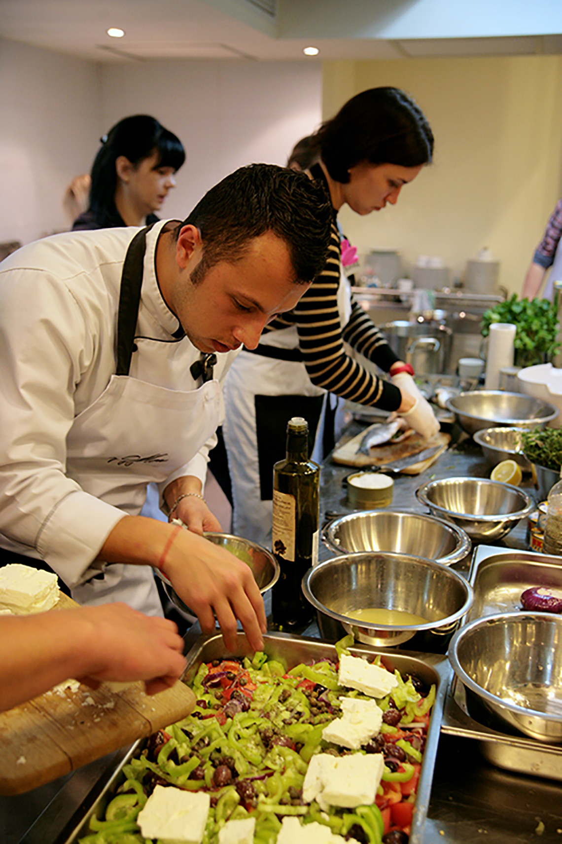 Croatian salad. Olive oil tasting during lesson "Greek Сuisine". Cooking classes in Ukraine.