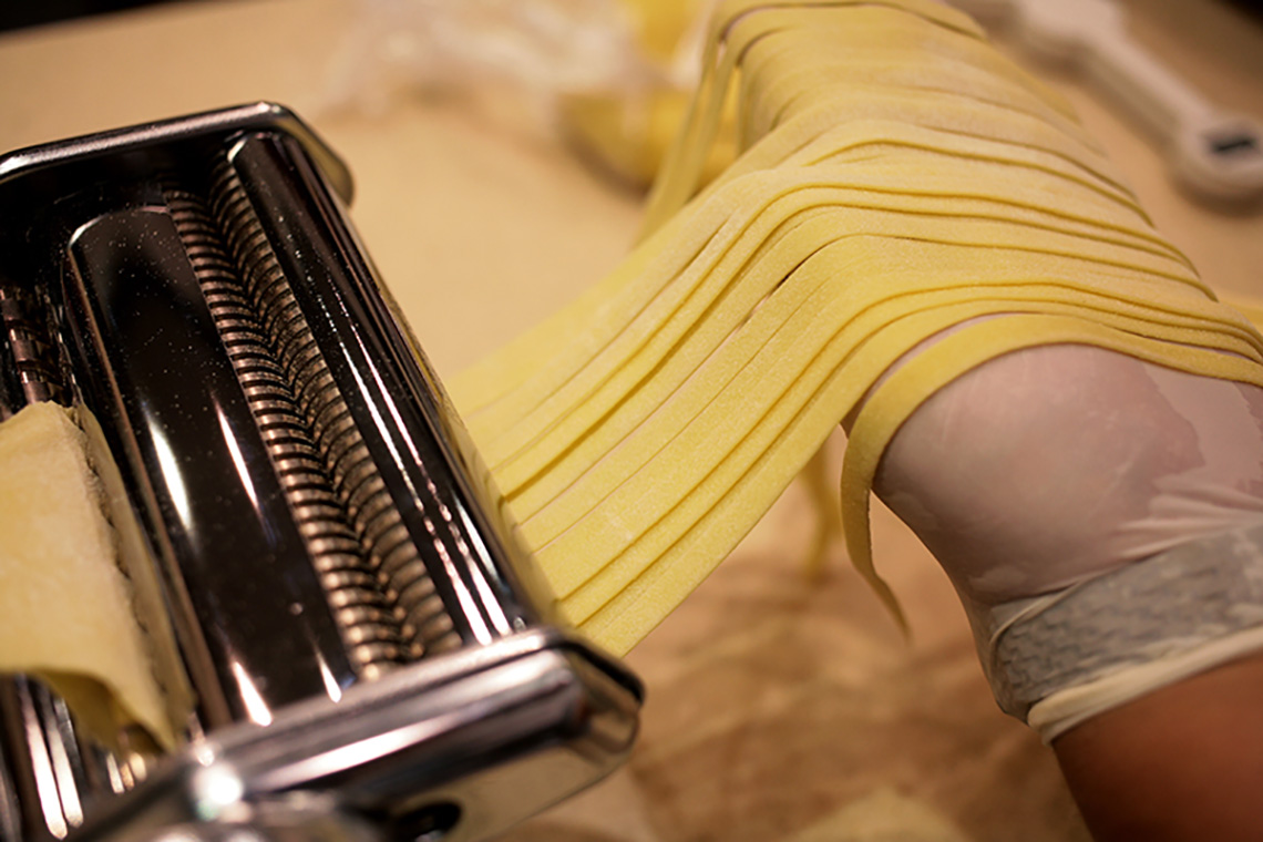 Cutting of pasta dough. Lesson "Pasta in Promenu". Cooking school in Ukraine.