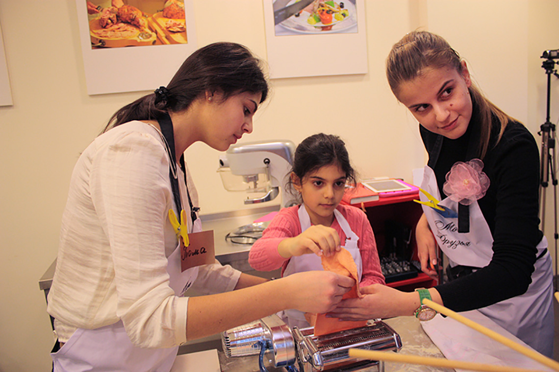 Pasta dough. Lesson in honour to International Women's Day. Cooking school in Ukraine.