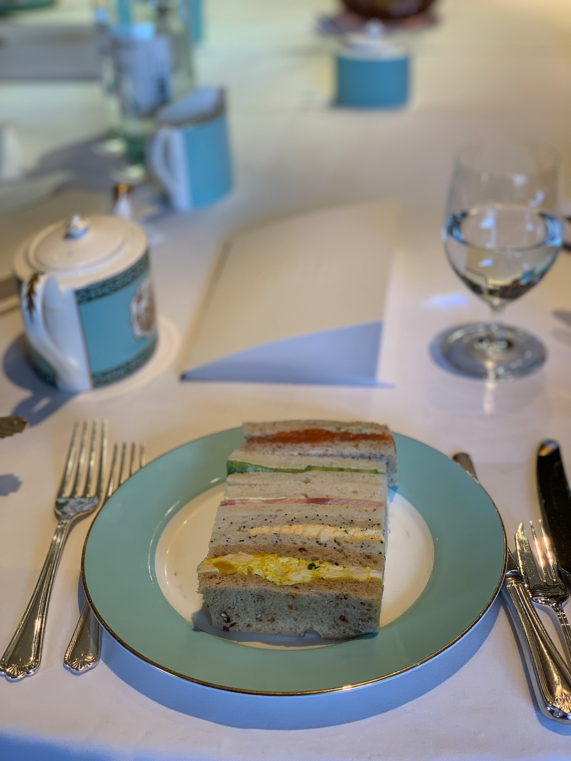Table setting for a tea etiquette lesson in the UK